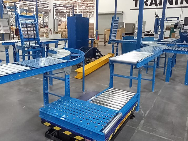 Bandas transportadoras y sistemas de rodillos para logística industrial